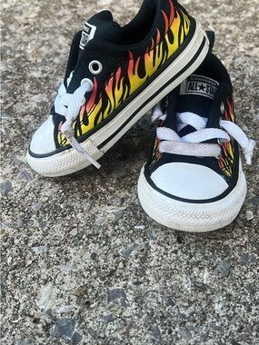 Converse Kids Low-Top Sneakers in Black with Red and Yellow Flame Print